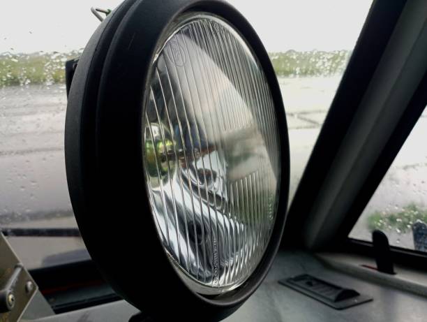 istock A round lighting device, a lantern with a thick glass diffuser. Illuminated devices and lamps. An auxiliary device for better orientation in the dark. 2154246226