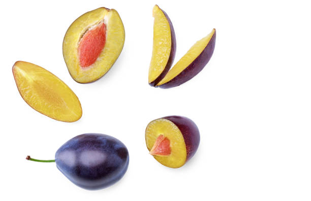 istock piece of fresh plum fruit isolated on white background. clipping path 2154246493