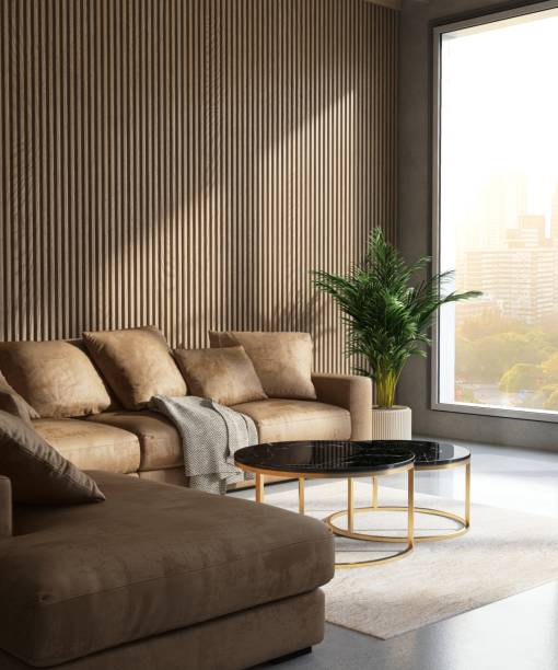 istock Brown sofa, round black marble coffee table in elegant living room in sunlight through window on corrugated wooden wall 2154248479