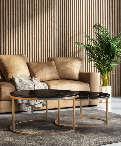 istock Brown sofa, round black marble coffee table in elegant living room in sunlight through window on corrugated wooden wall 2154248482