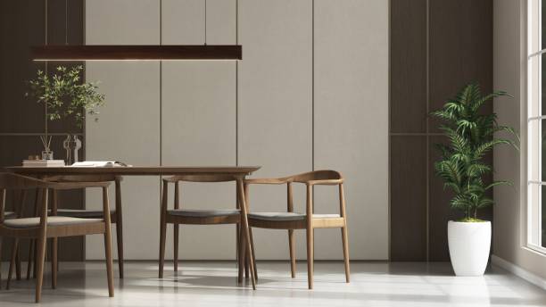 istock Modern, minimal wooden dining table, chairs, pendant light and tree in sunlight from window on luxury white and brown wall dining room 2154249051