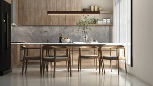 istock Modern, luxury kitchen with built in wooden cabinet, cupboard, white top island, pendant light and dining table, chairs in sunlight 2154249068