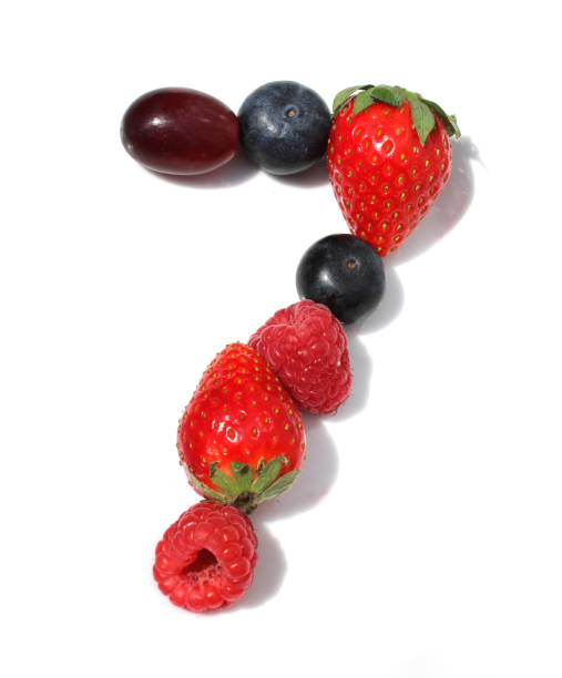 istock number 7 from raspberry, blackberry, strawberry with green leaf, blueberries, grape. isolated berries numbers for party 2154250384