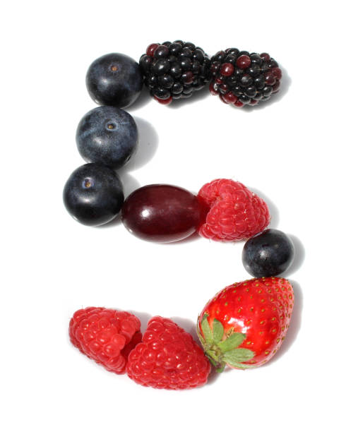 istock number 5 made from raspberry, blackberry, strawberry with green leaf, blueberries, grape. isolated berries numbers for party organic recipe 2154250584