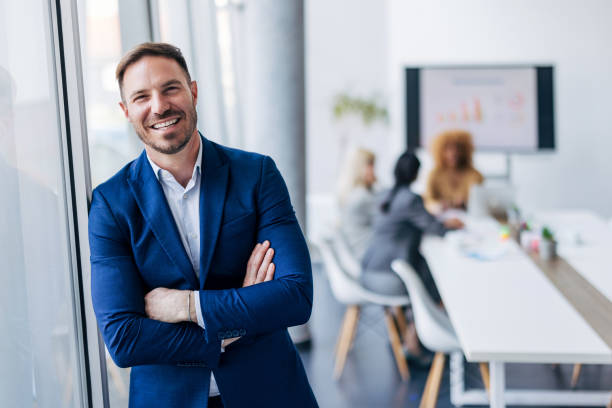 istock Smiling business person in office setting 2154250707