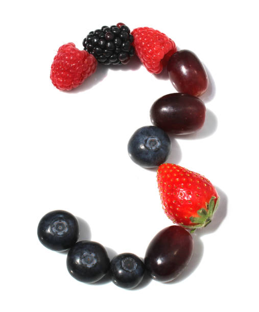 istock number 3 made from raspberry, blackberry, strawberry with green leaf, blueberries, grape. isolated berries numbers for party organic recipe 2154250856
