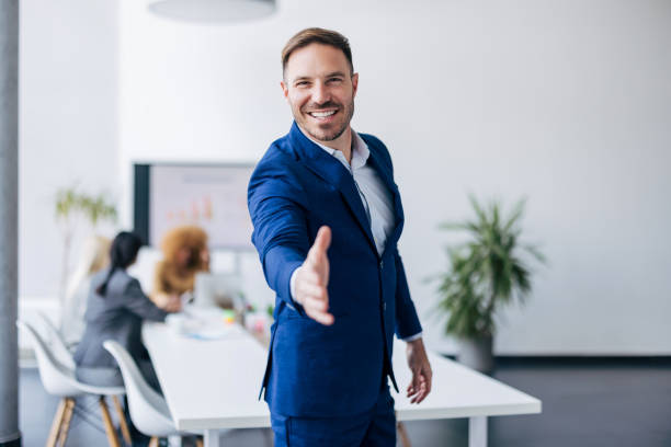 istock Manager extending hand in a welcoming gesture 2154251547