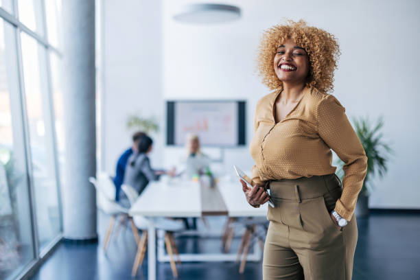 istock Cheerful businesswoman enjoying work moment 2154251577