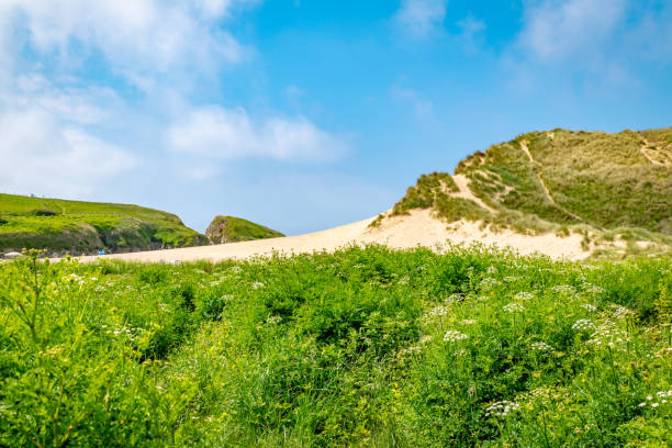 Large sand dunes at Holywell Beach in Cornwall