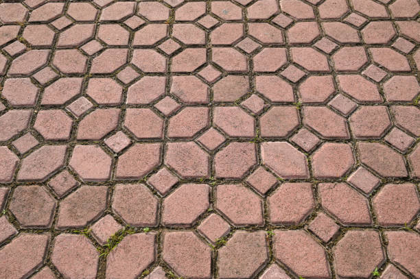 istock Coating with modern textured paving tiles of square shape 2154257587