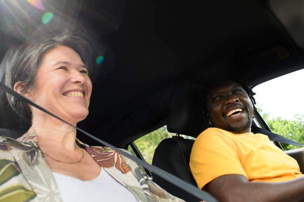 istock An enthusiastic couple in a car getting ready to leave 2154259534