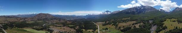 istock Carretera Austral tarmac road and jagged black mountain peaks 2154264865
