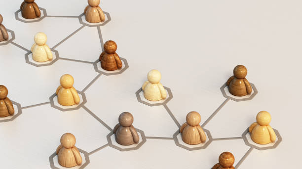 istock Diverse Wooden Figurines Connected in Network Formation on Light Background. Communication Concept 2154265716
