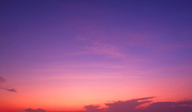 istock Colorful twilight sky background with beautiful pink and orange cloud on idyllic blue evening sky 2154266680