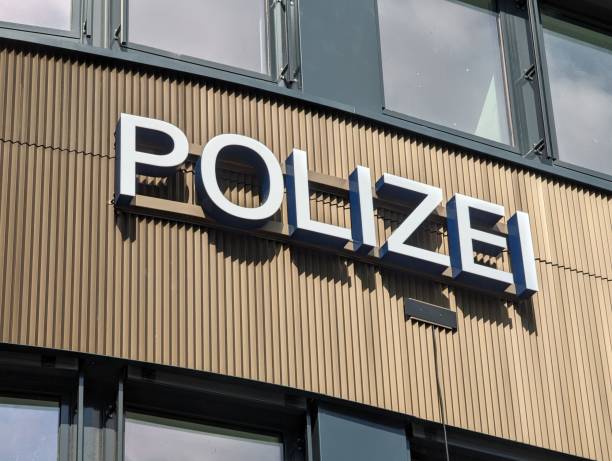 istock German police sign on the house facade 2154266774