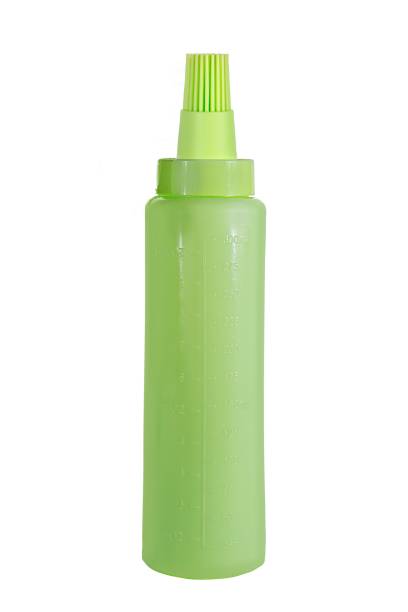 istock Barbecue and grill plastic oil bottle kitchen with brush tool on White Background 2154267300