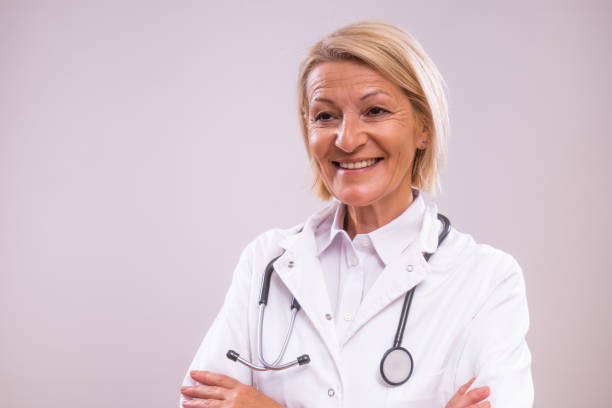 istock Mature female doctor thinking 2154267929