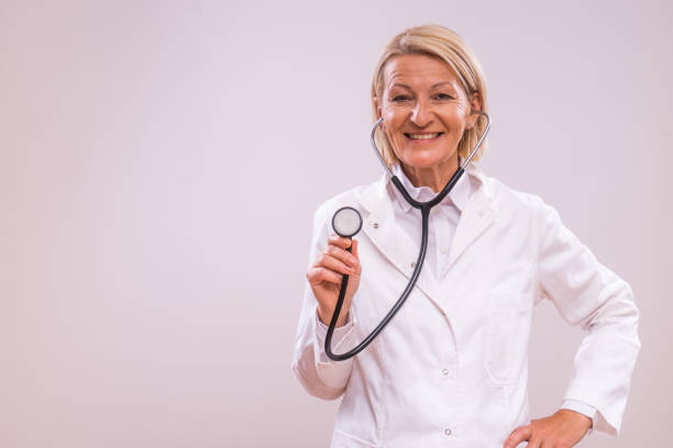 istock Mature female doctor with stethoscope 2154268027
