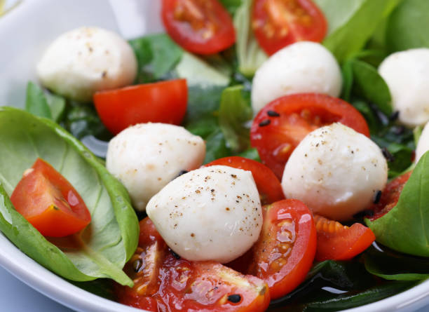 Mozzarella cheese balls with a drizzle of olive oil