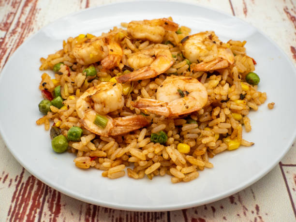 istock shrimp, stir fried vegetables and shrimps on plate 2154275856