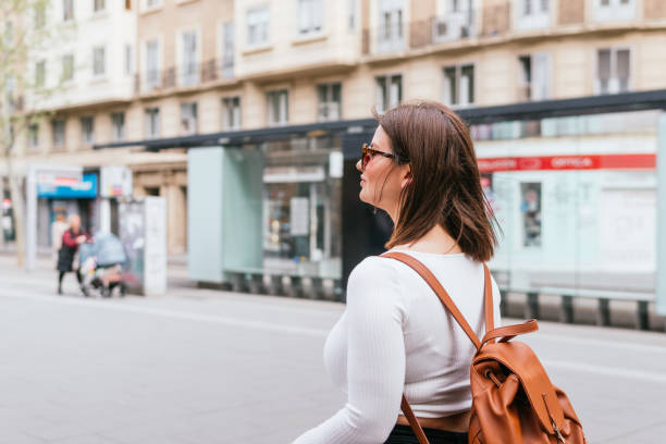 istock Tourist walking next to tram stop 2154283396