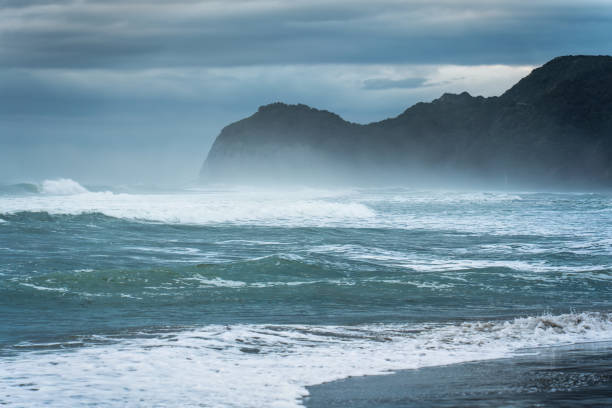 istock Moody sea with breaking wave on coastline 2154285007