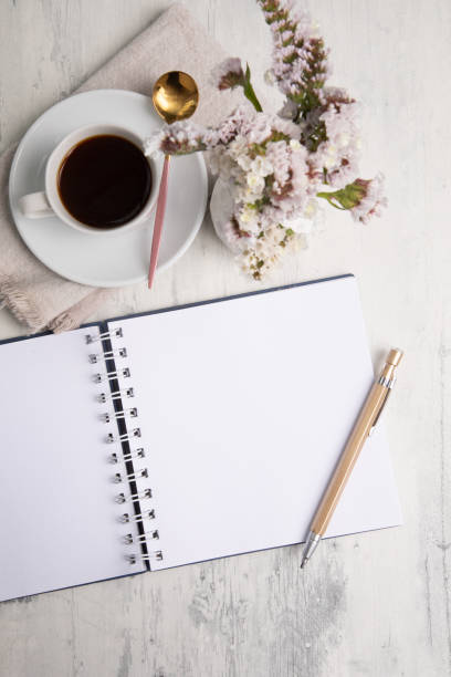 istock Little white Cup of black expresso coffee with little notepad 2154289993