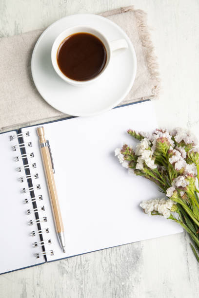 istock Little white Cup of black expresso coffee with little notepad 2154290050