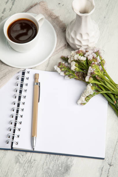 istock Little white Cup of black expresso coffee with little notepad 2154290285
