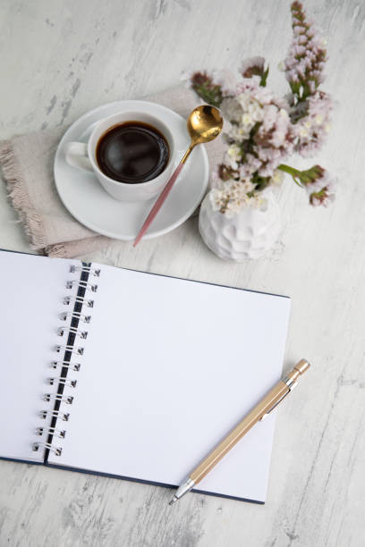 istock Little white Cup of black expresso coffee with little notepad 2154290301