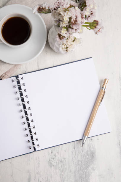 istock Little white Cup of black expresso coffee with little notepad 2154290353