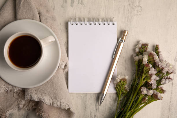 istock Little white Cup of black expresso coffee with little notepad 2154290384