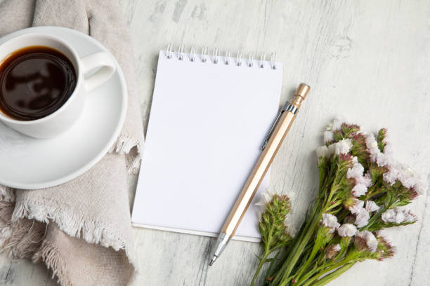 istock Little white Cup of black expresso coffee with little notepad 2154290397