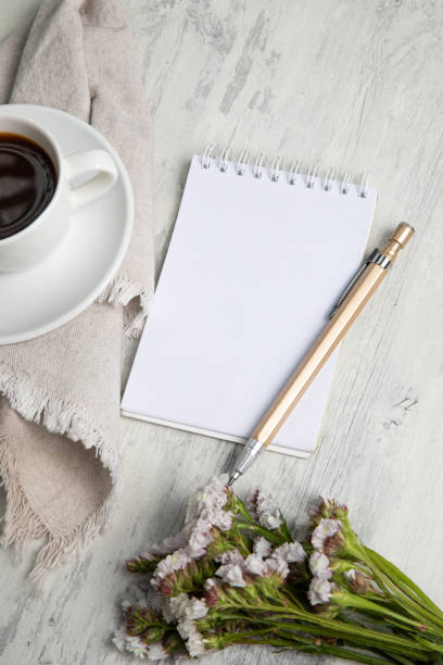 istock Little white Cup of black expresso coffee with little notepad 2154290405