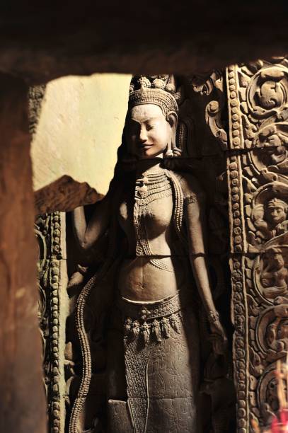 Angkor Wat, Cambodia - 2010, August 8 : A low relief of a female figure, most likely an apsara, on the wall of the temple complex of Angkor Wat in Siem Reap, Cambodia