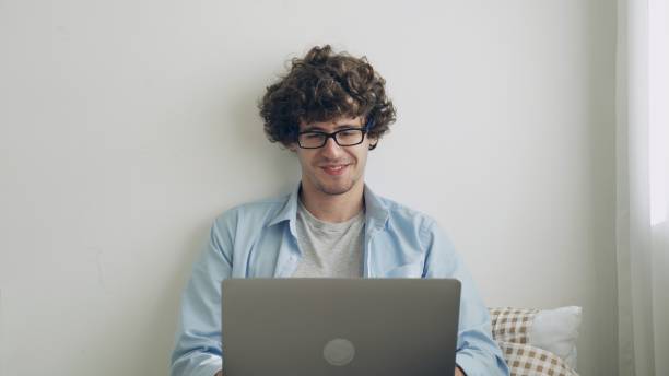 istock Young  businessman or freelance working and use a computer laptop and thinking idea for his business 2154296971