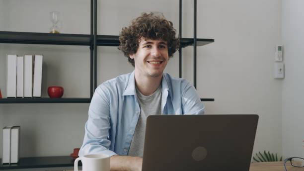 istock Young  businessman or freelance working and use a computer laptop and thinking idea for his business 2154296974