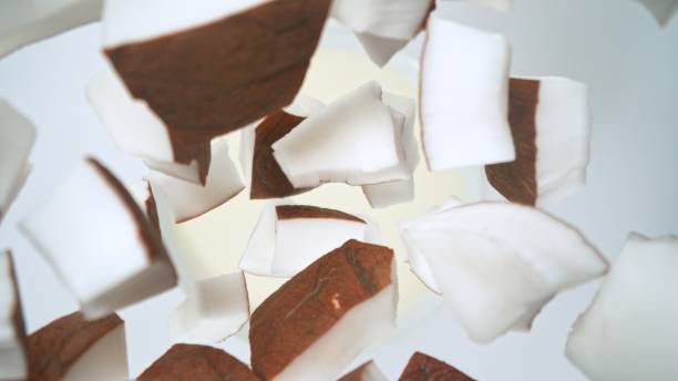 istock Freeze motion of coconut pieces falling into cream 2154299470