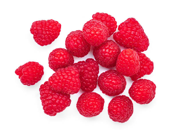 istock Raspberry isolated. Fresh raspberries on white background. Heap of rasbrries top view, flat lay 2154303587