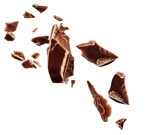istock Chocolate explosion isolated on white.  Flying Chocolate pieces  Top view. Package design elements Flat lay. Top view. 2154307746