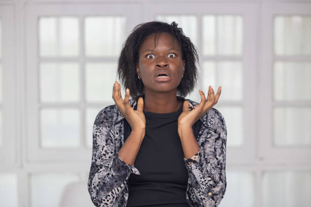 istock Stressed black woman grabbing her with frustration 2154310177