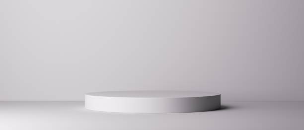 istock 3d render. Abstract background, empty round stage platform or podium. Blank showcase for product presentation. Modern white minimalist wallpaper. Light and shadow 2154313187