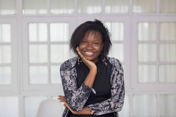 istock Happy black woman with pose with  smile 2154313395