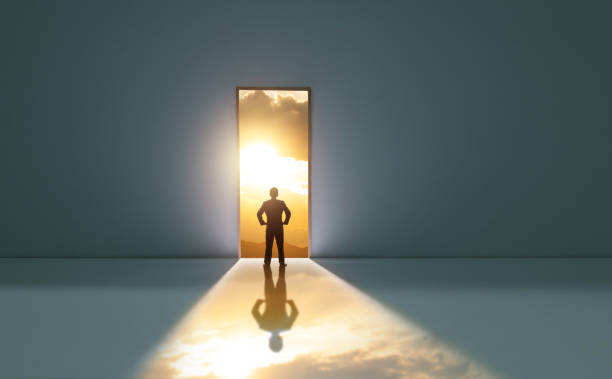 istock Businessman standing in front of open door 2154315687