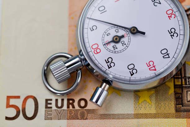 A stopwatch on European currency