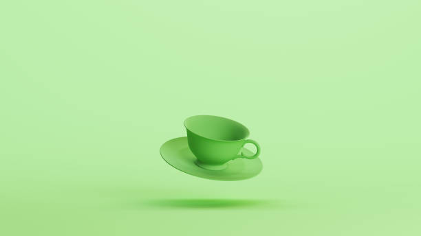 istock Green mint tea cup saucer plate dishware tea cafe pottery soft tones background 2154321197