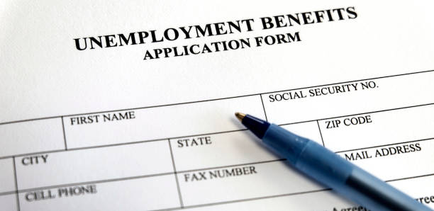 istock Unemployment Benefits Application Form Paper to be Filled Out 2154327235