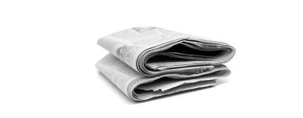 istock Newspaper Stacked Up on White Breaking News Written Communication 2154327275