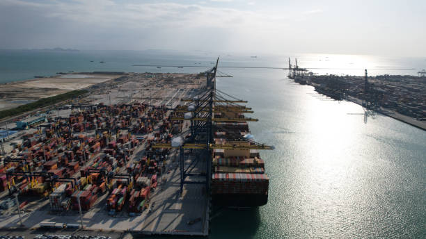 istock Container terminal port aerial view. Industrial cargo port. Logistic center. Import and export port and is part of a shipping dock at the harbor 2154330206