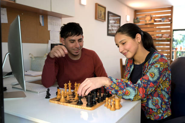 istock playing board games after work in the office 2154330581